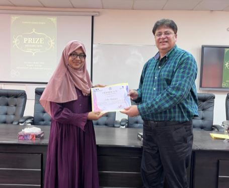 Prof.-Arman-Rasool-Faridi-felicitating-the-student-during-the-prize-distribution-ceremony-at-dept-of-Computer-Science-.jpg